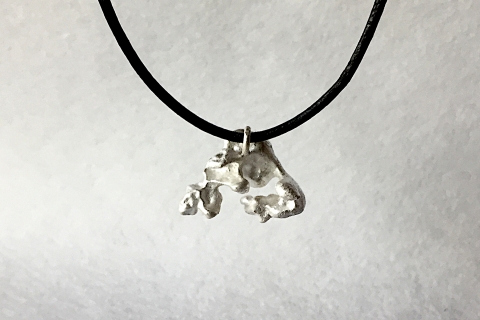 One-of-a-kind bean-casted sterling silver pendant