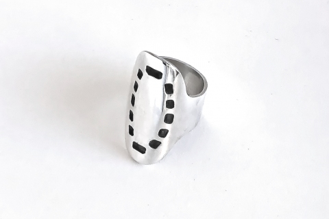 Large sterling sterling ring with square piercing enhanced with black patina
