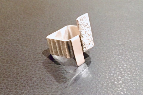 Square silver ring with opposite polished and fused silver dust plates